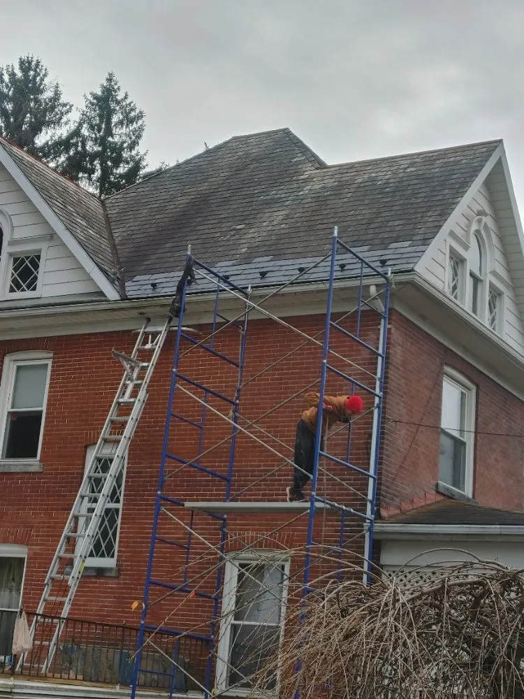 Slide of Malone Roofing