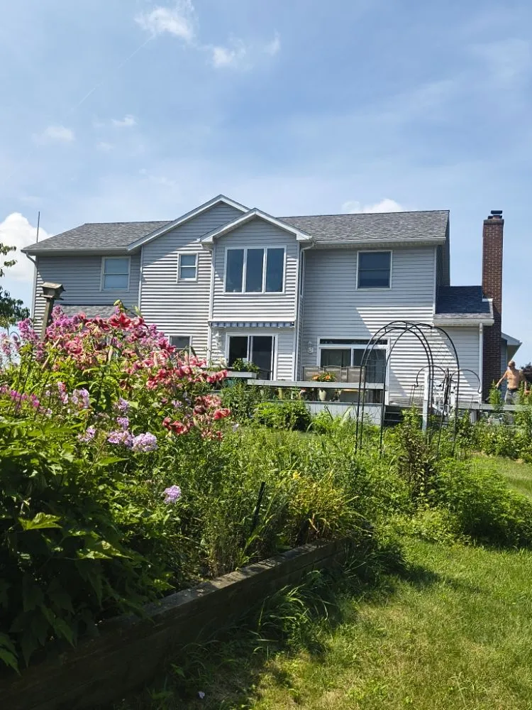 Slide of Malone Roofing