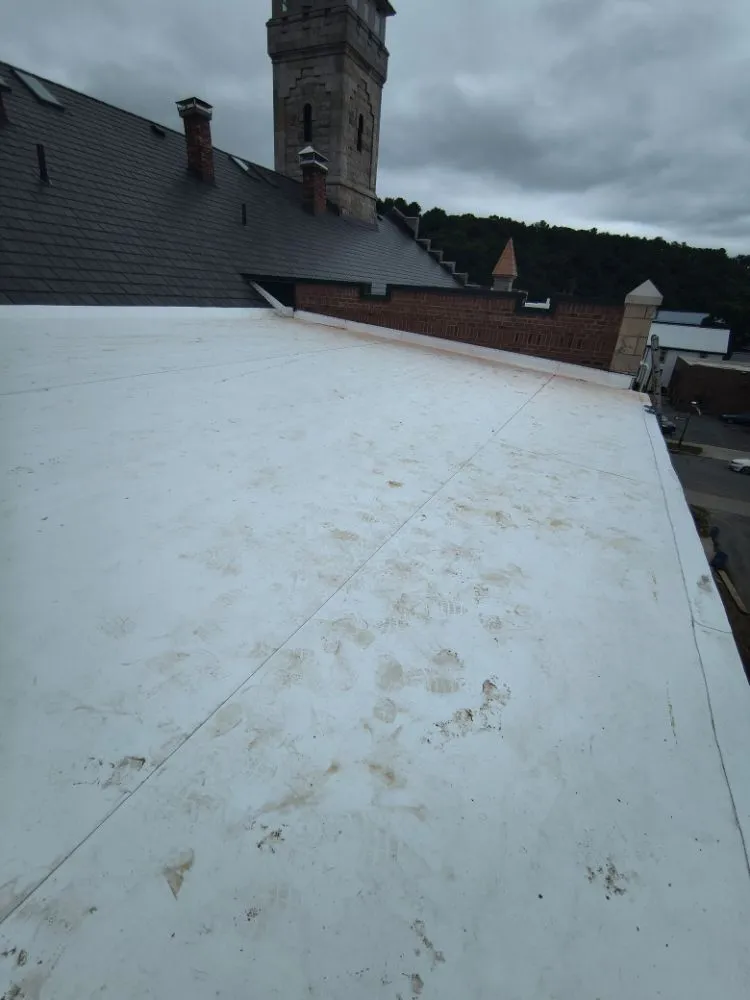 Slide of Malone Roofing