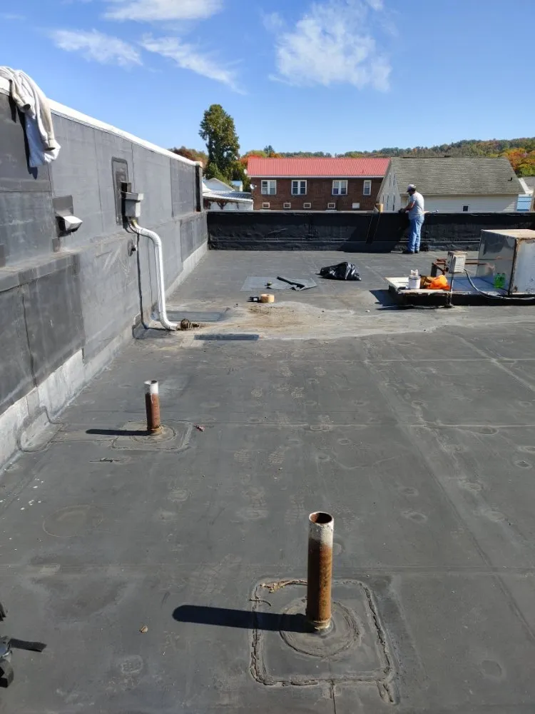 Slide of Malone Roofing