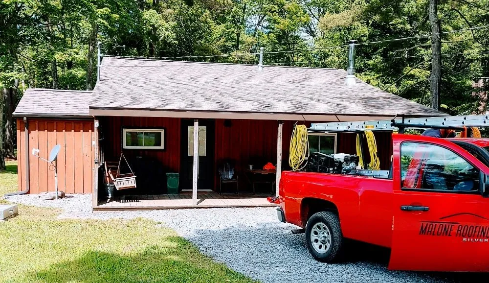 Slide of Malone Roofing