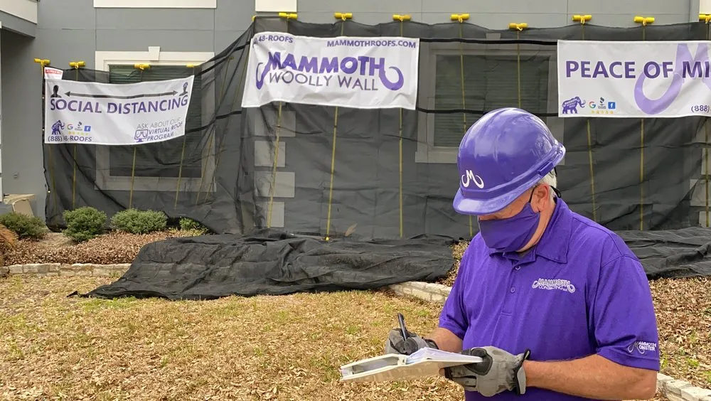 Slide of Mammoth Contracting - Round Rock