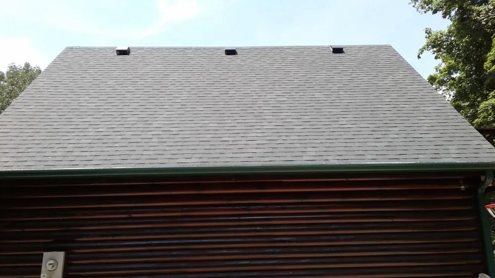 Slide of Man and Husky Roofing