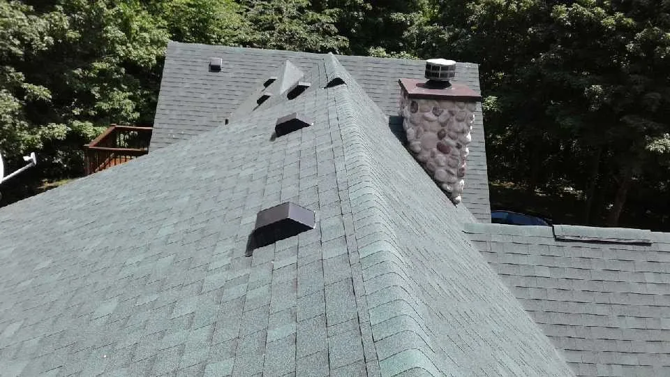 Slide of Man and Husky Roofing