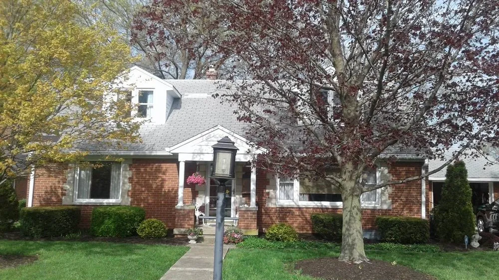 Slide of Man and Husky Roofing