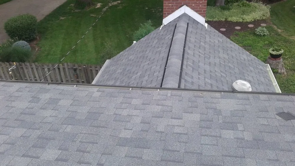 Slide of Man and Husky Roofing