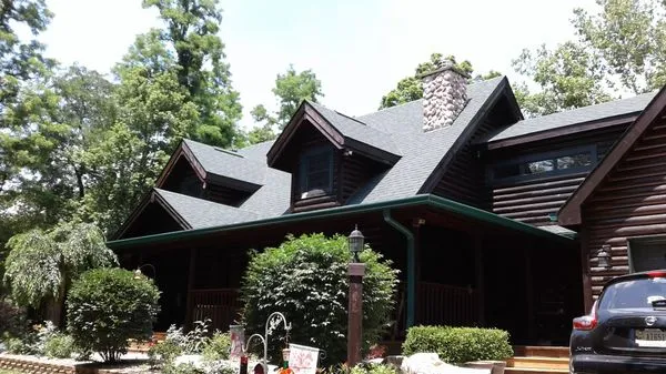 Man and Husky Roofing