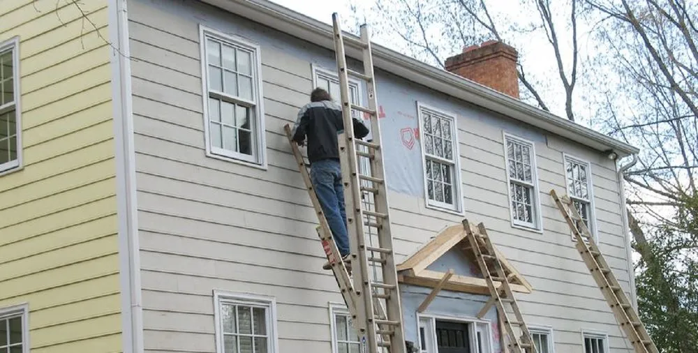 Slide of Man of Steel Roofing - Sterling Heights