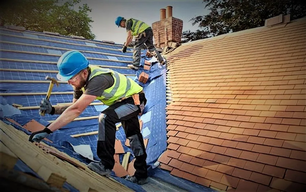 Slide of Man of Steel Roofing - Sterling Heights