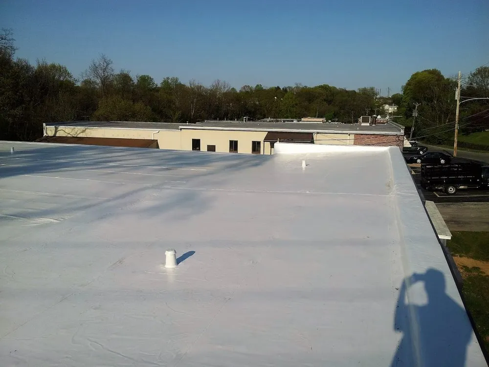 Professional shingle roofing service after storm damage in West Caln Township, PA by Manchester Commercial Roofing Systems