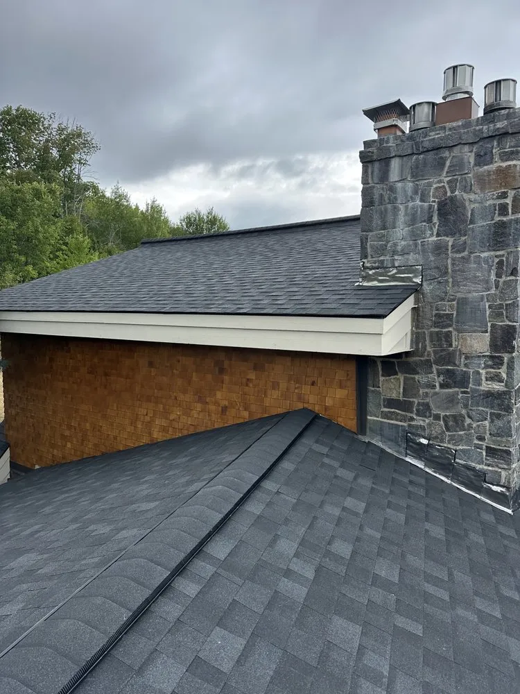 Slide of Mandette Roofing Plus