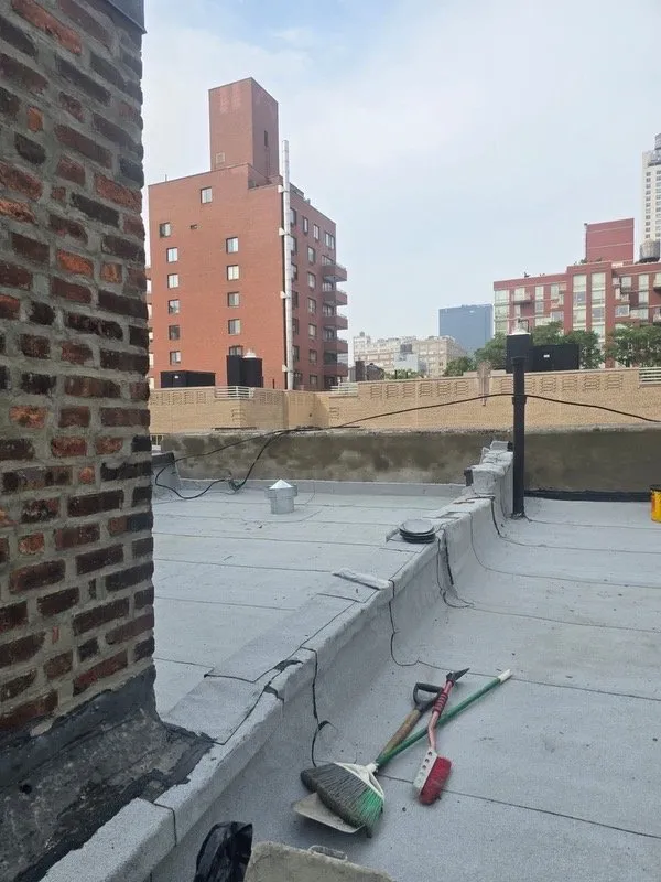 Slide of Manhattan Roofing