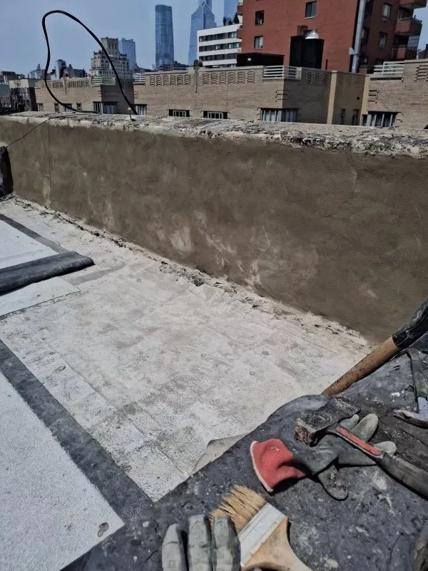 Slide of Manhattan Roofing