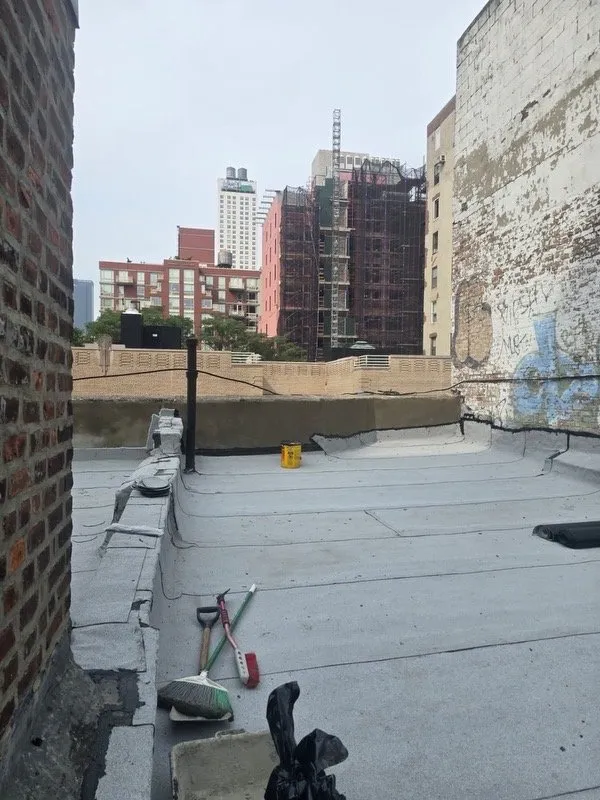 Slide of Manhattan Roofing