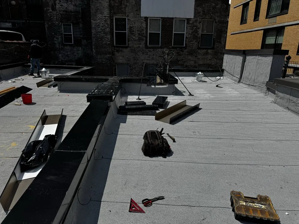 Slide of Manhattan Roofing