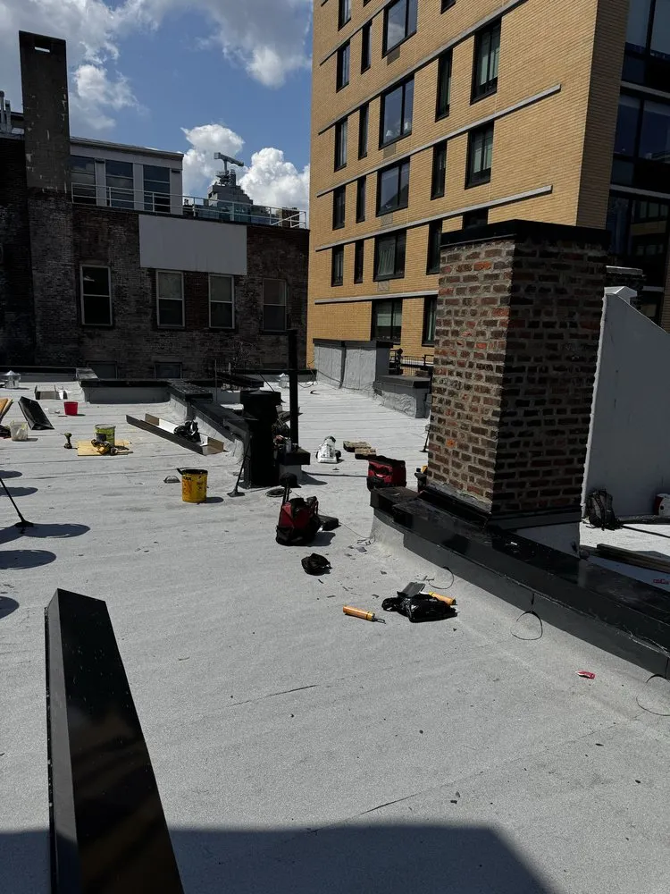 Slide of Manhattan Roofing