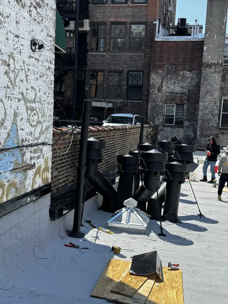 Slide of Manhattan Roofing