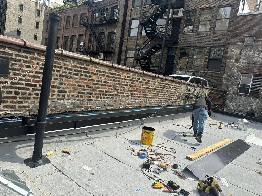 Slide of Manhattan Roofing