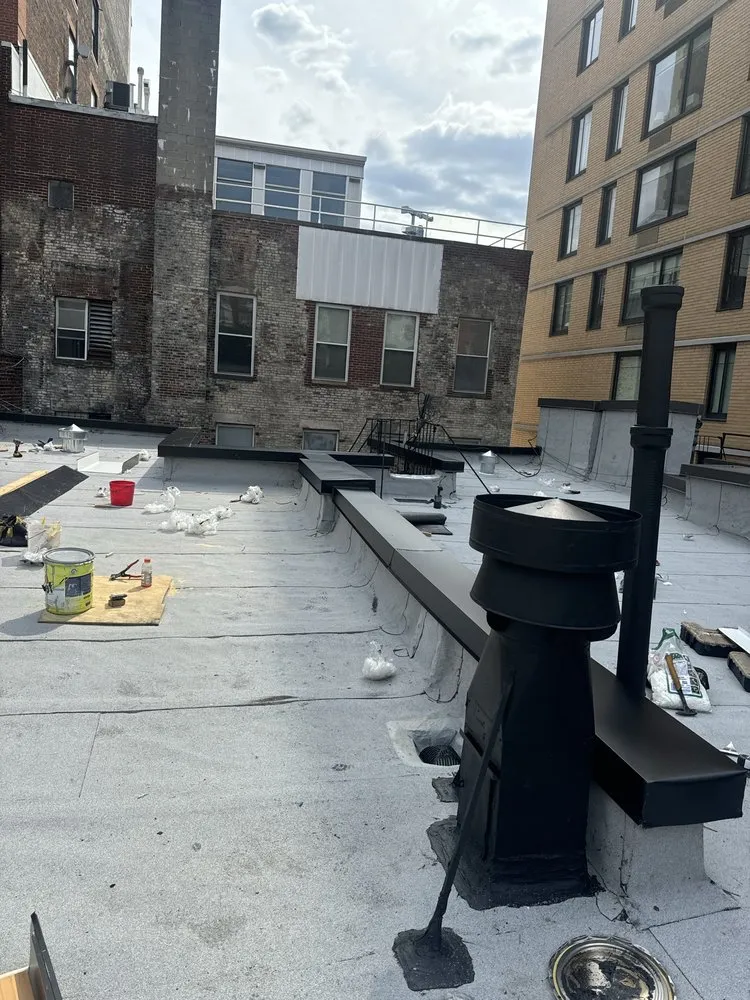 Slide of Manhattan Roofing