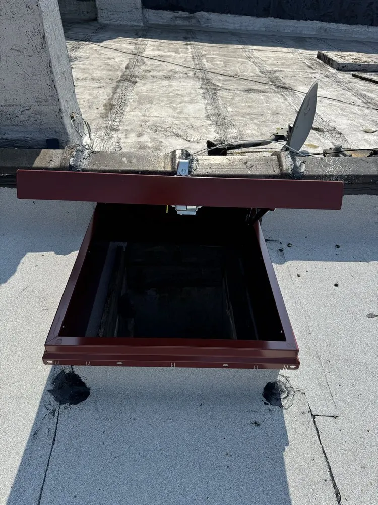 Slide of Manhattan Roofing