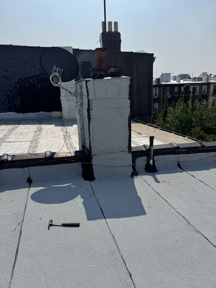 Slide of Manhattan Roofing