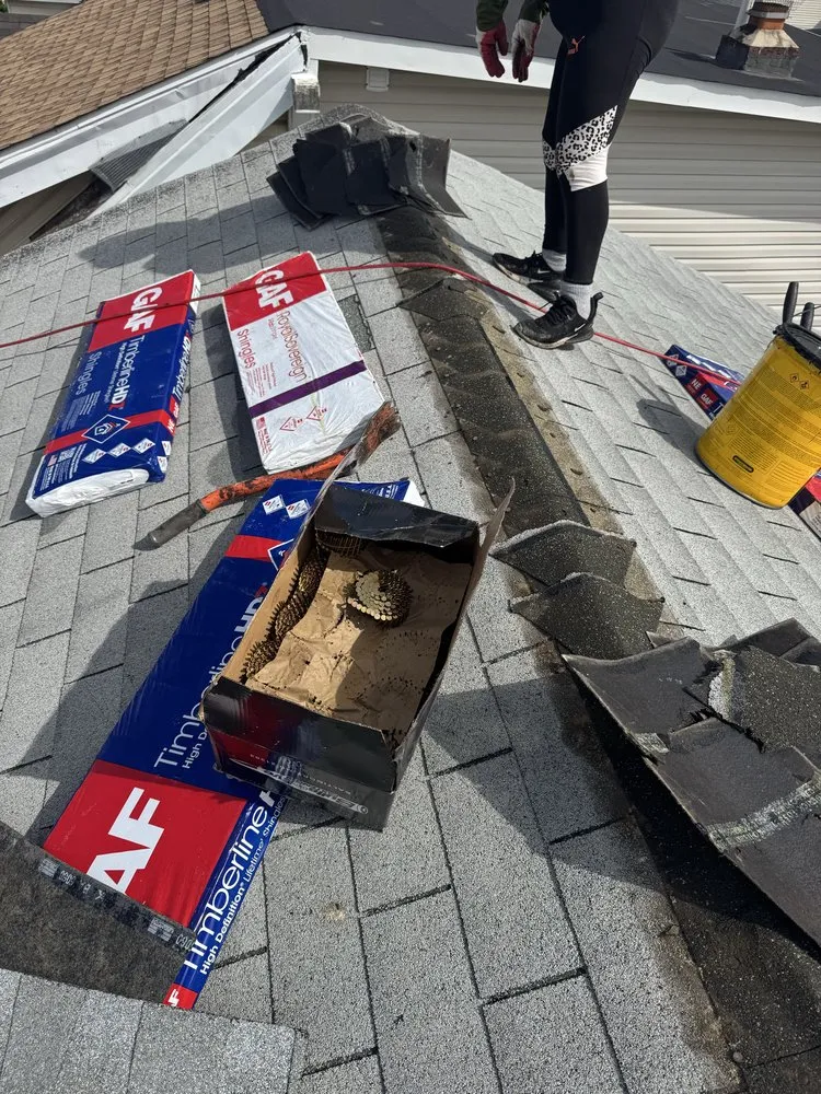 Slide of Manhattan Roofing