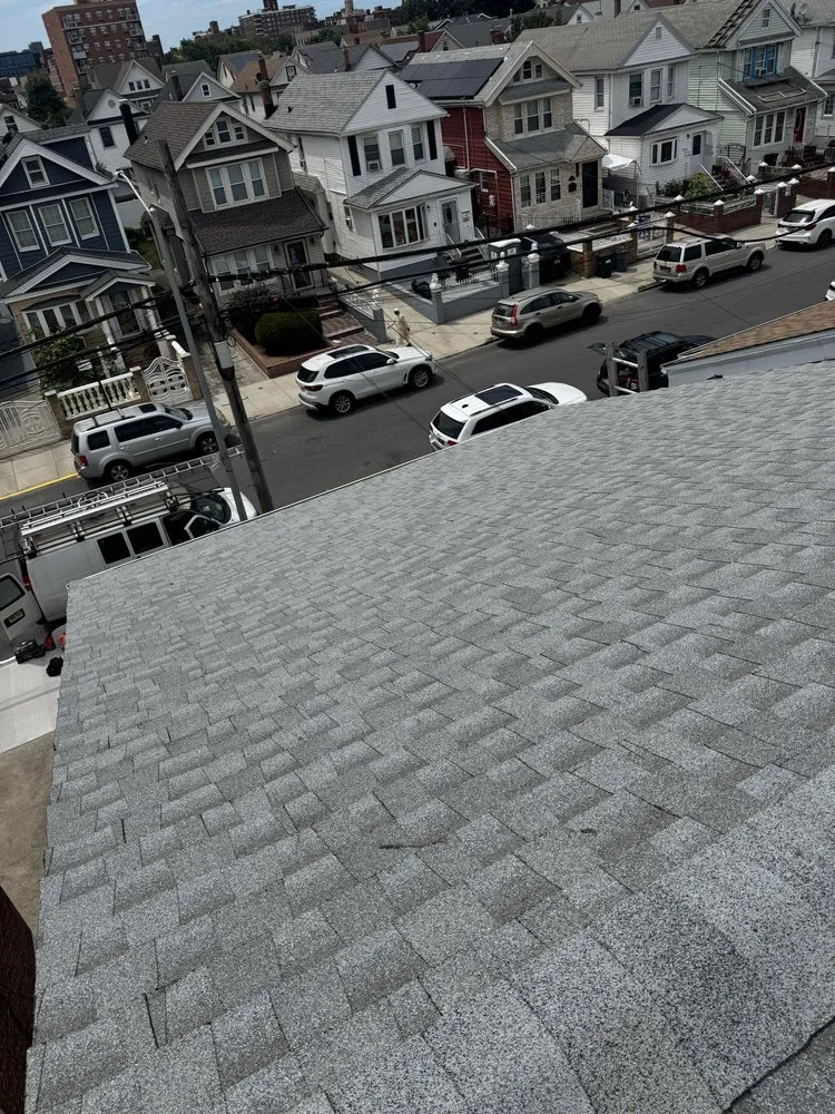 Slide of Manhattan Roofing