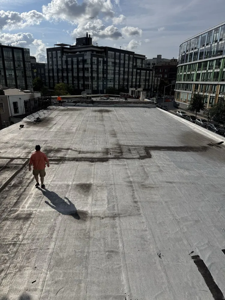 Slide of Manhattan Roofing