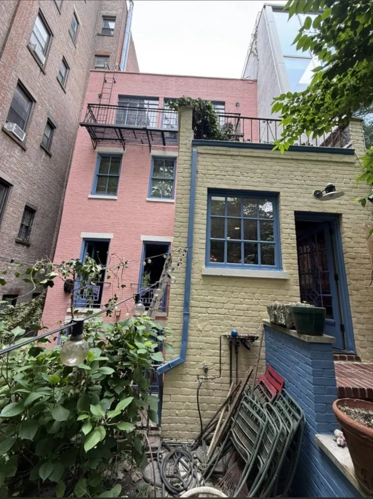 Slide of Manhattan Roofing