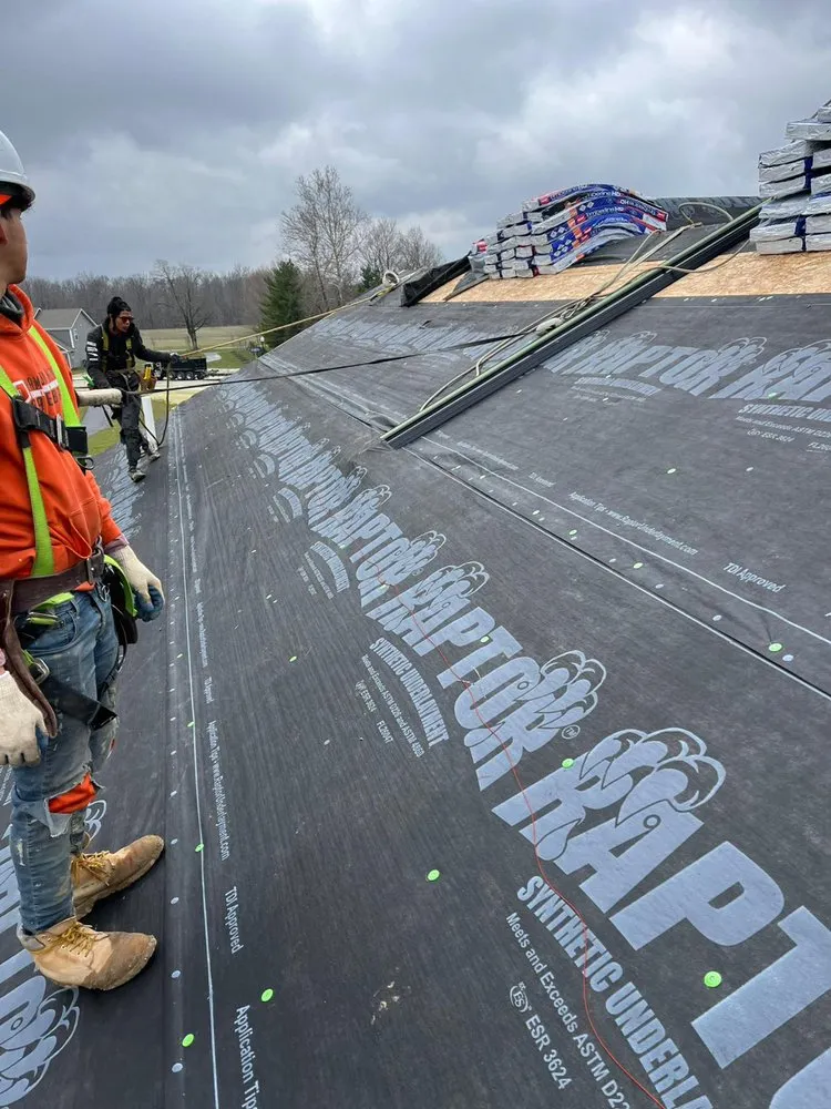 Slide of Manjoa Roofing