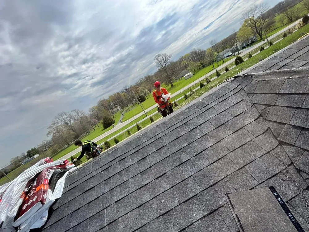 Slide of Manjoa Roofing