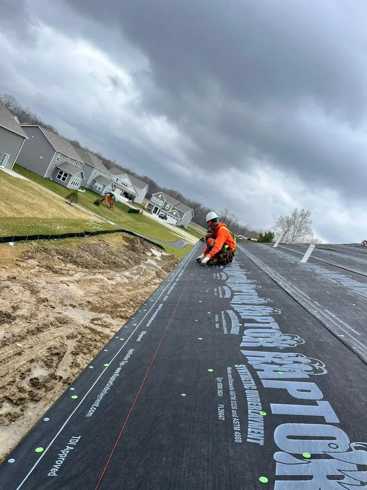 Slide of Manjoa Roofing