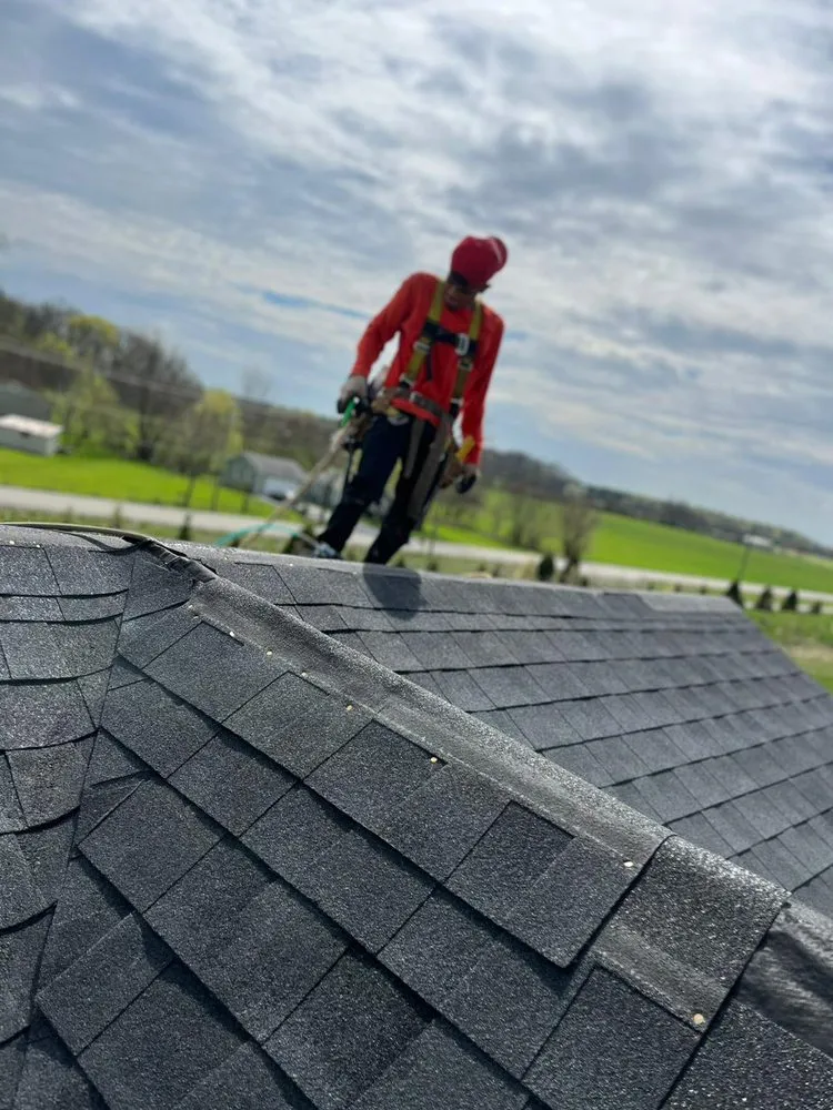 Slide of Manjoa Roofing