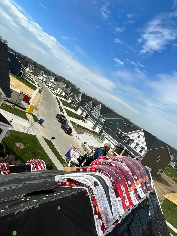 Slide of Manjoa Roofing