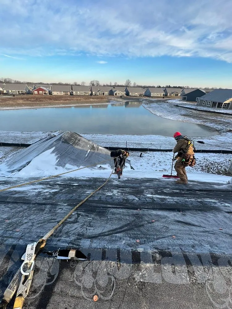 Slide of Manjoa Roofing