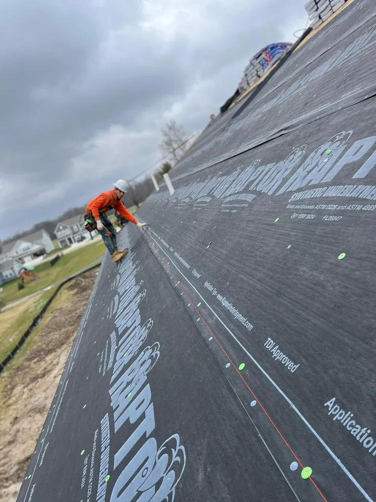 Slide of Manjoa Roofing