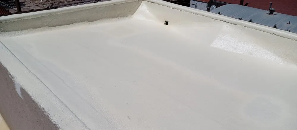 Slide of Mann & Sons Roofing