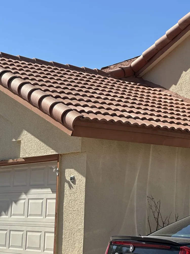 Slide of Mann & Sons Roofing