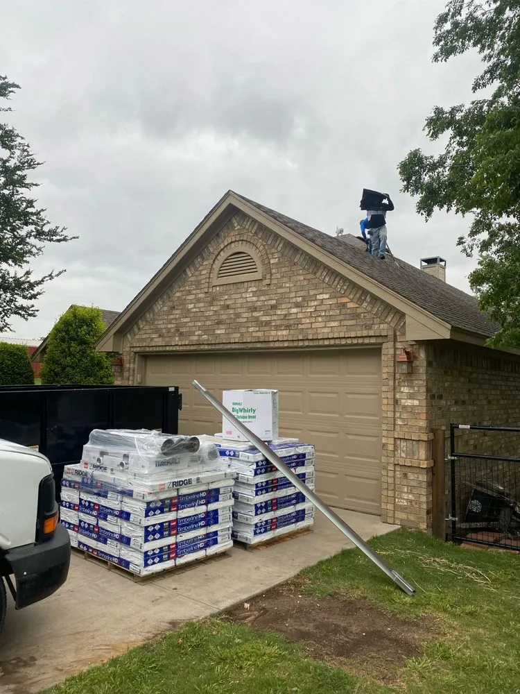 Slide of Mann & Sons Roofing