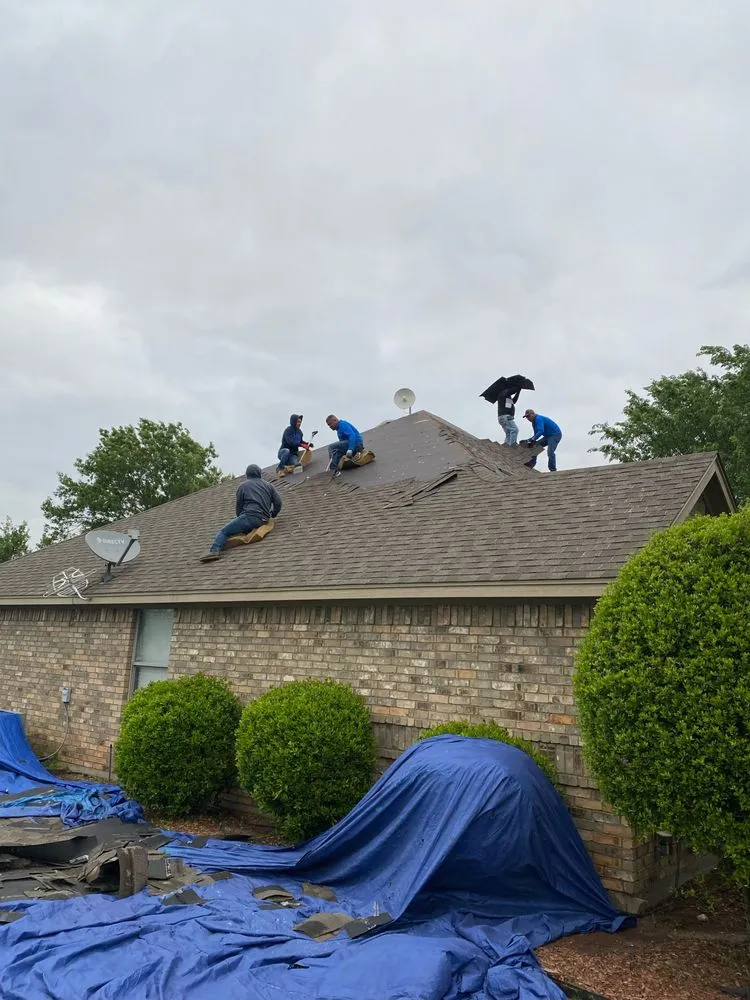 Slide of Mann & Sons Roofing