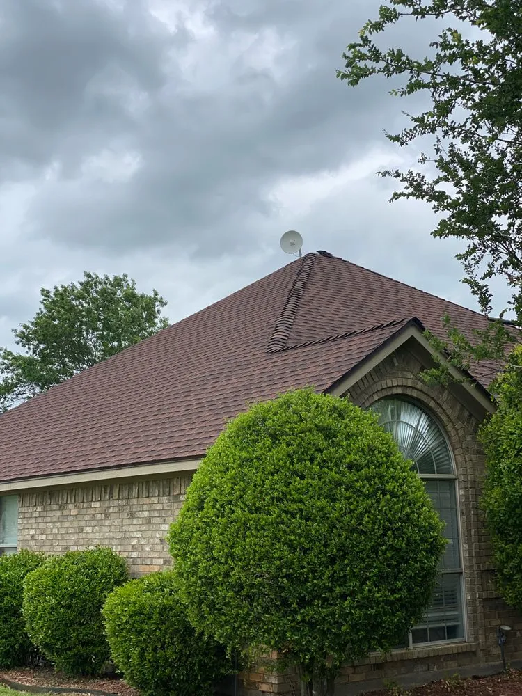 Slide of Mann & Sons Roofing