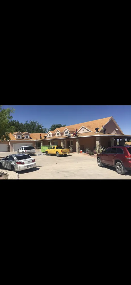 Slide of Mann & Sons Roofing