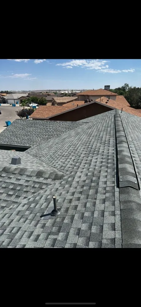 Slide of Mann & Sons Roofing