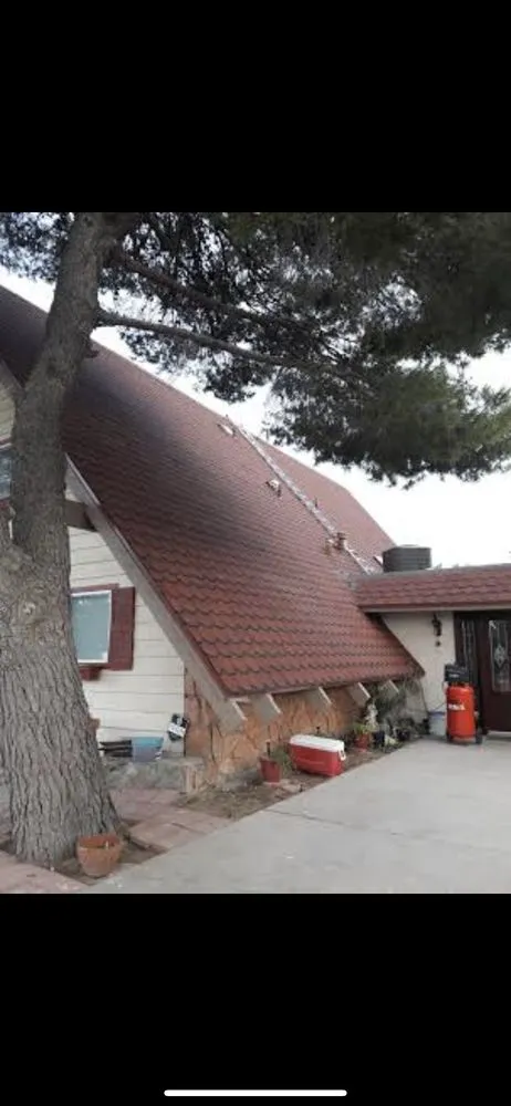 Slide of Mann & Sons Roofing