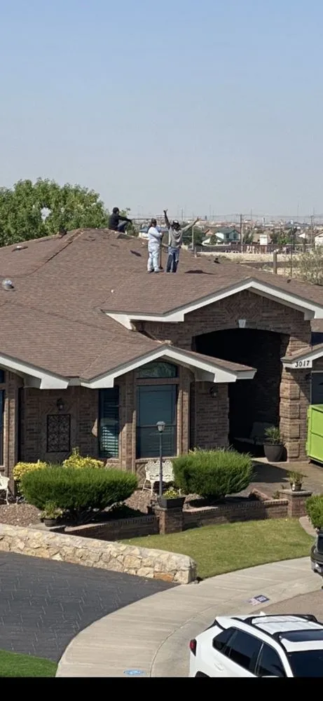 Slide of Mann & Sons Roofing