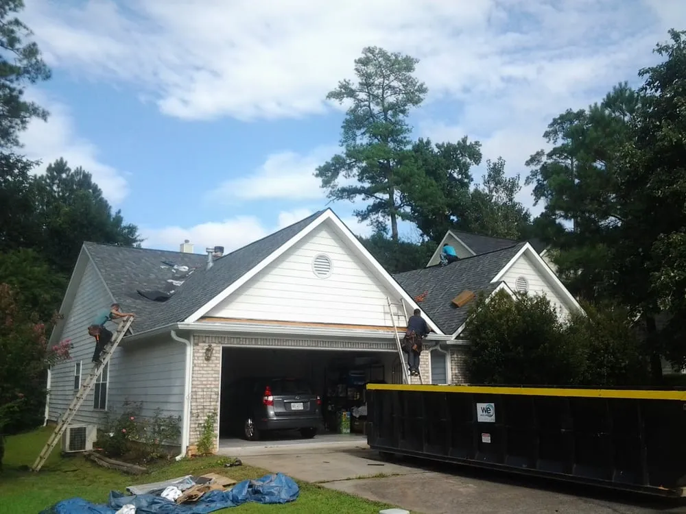 Slide of Manna Roof & Construction