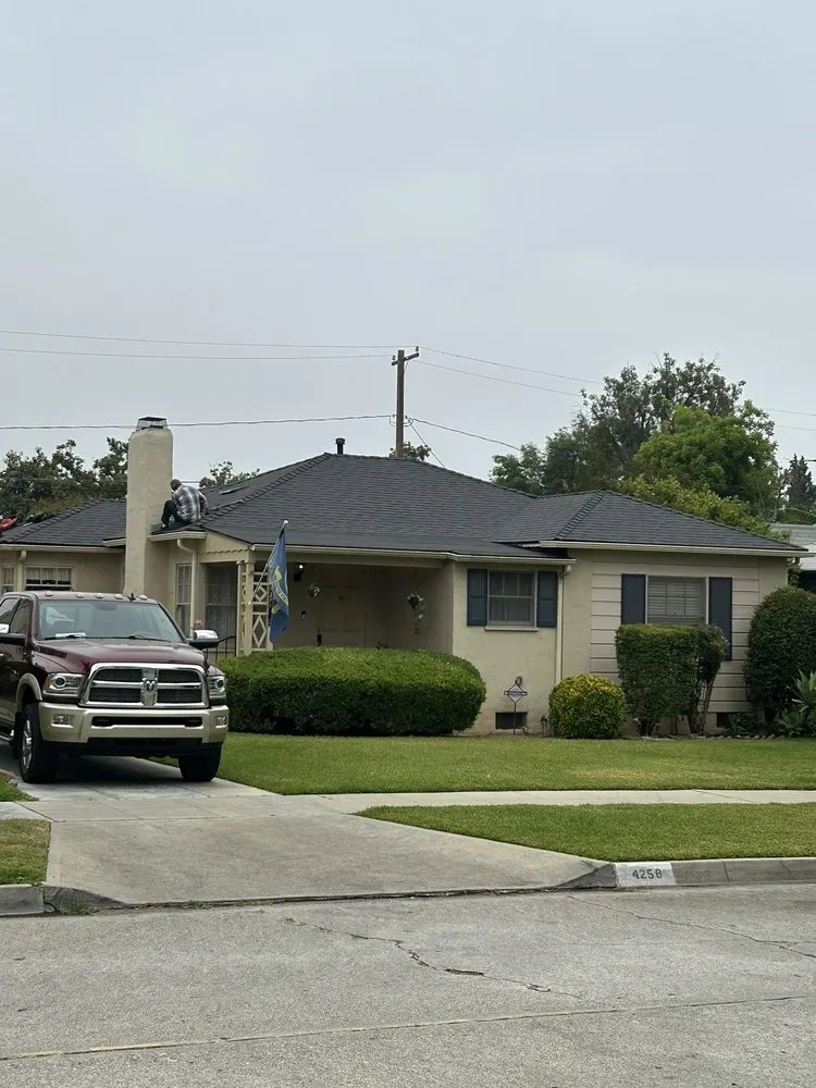 Slide of Manna Roofing Company