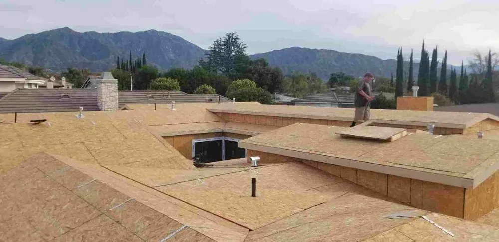 Slide of Manna Roofing Company