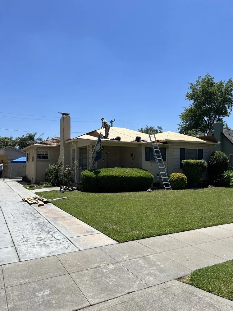 Slide of Manna Roofing Company