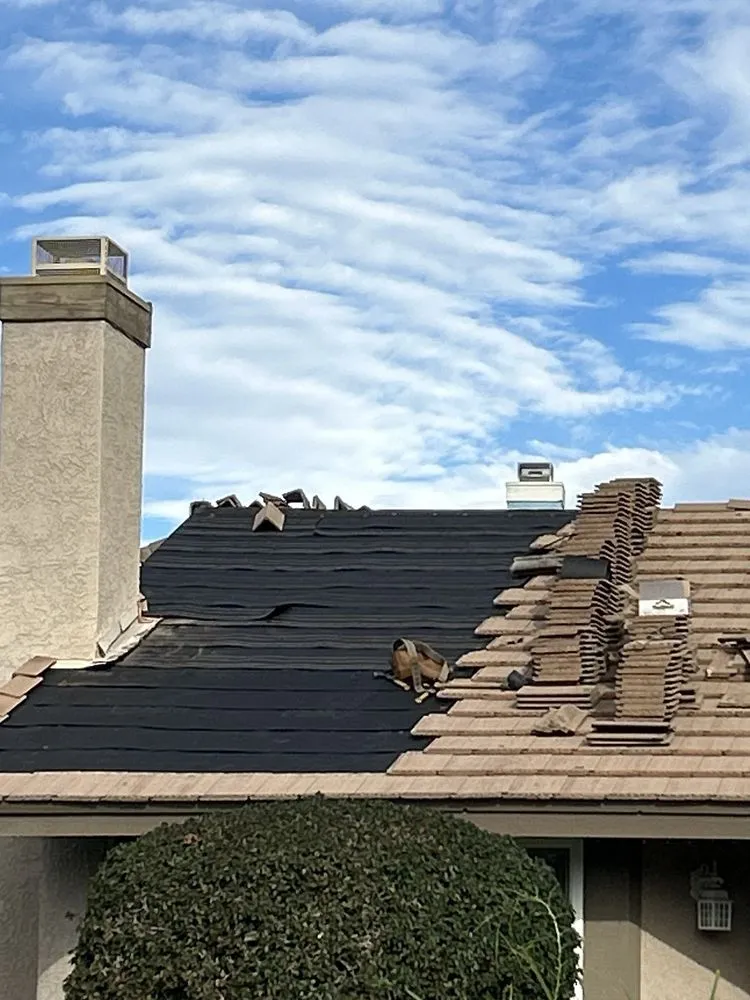 Slide of Manna Roofing Company